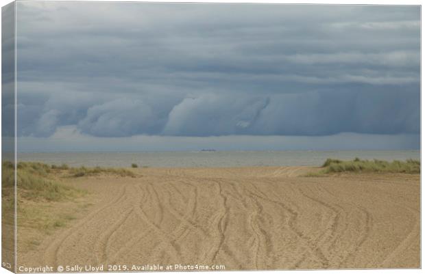 Storm clouds rolling at Great Yarmouth Canvas Print by Sally Lloyd