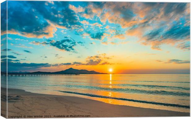 Idyllic sunrise at bay of Alcudia beach Mallorca Canvas Print by Alex Winter