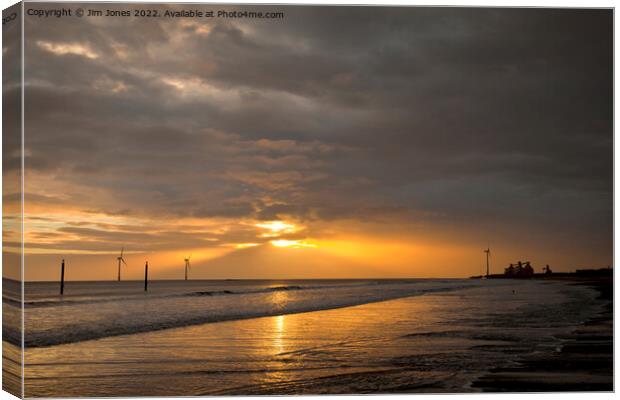 Sunrise on the Northumbrian coast Canvas Print by Jim Jones