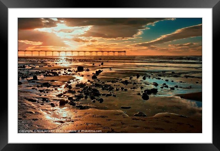 Angel light over Saltburn Beach Framed Mounted Print by ROS RIDLEY