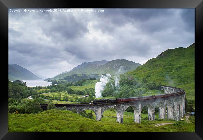 Jacobite Express crossing Glenfinnan Viaduct Framed Print by Howard Kennedy