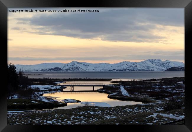 Winter sunset over Þingvellir  Framed Print by Claire Wade