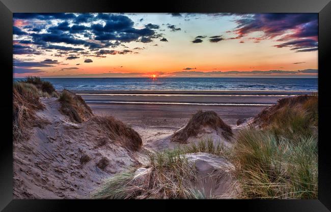 Sunset over Formby Beach through dunes Framed Print by Steve Heap
