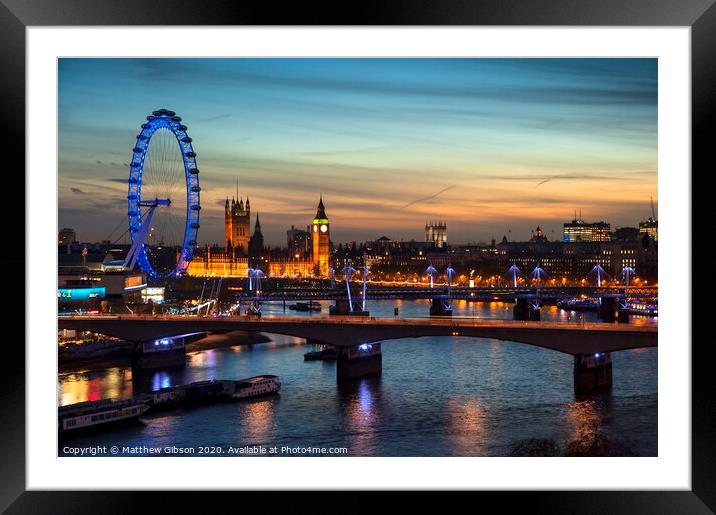 Beautiful landscape image of the London skyline at night looking along the River Thames Framed Mounted Print by Matthew Gibson