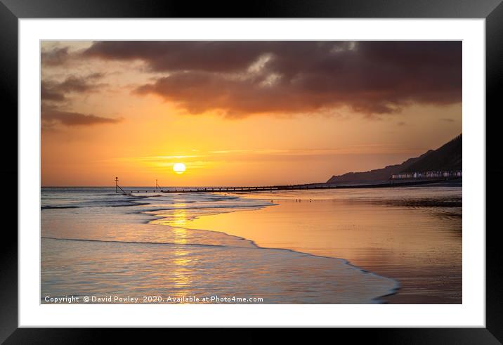 Sunrise over Cromer beach Framed Mounted Print by David Powley