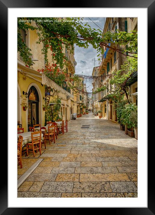 Shaded street in Corfu Town Framed Mounted Print by John Gilham