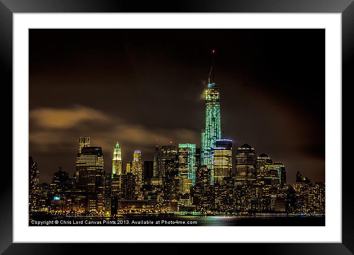 Downtown Manhattan At Night Framed Mounted Print by Chris Lord