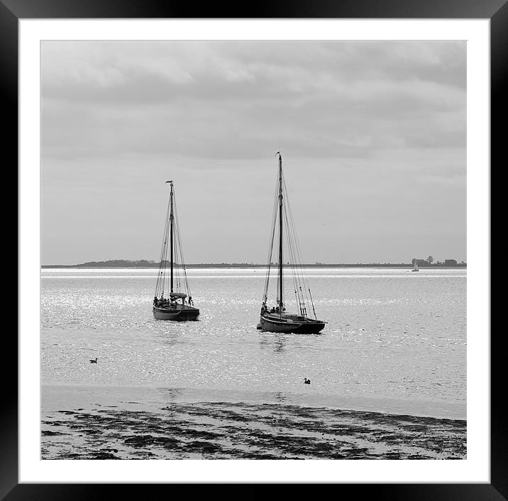 Traditional boats on a tranquil mooring Framed Mounted Print by Gary Eason
