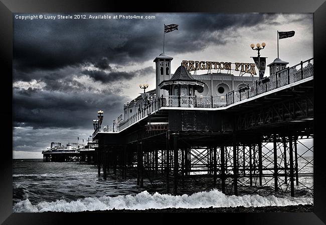 Brighton Pier amidst the storm Framed Print by Lucy Steele