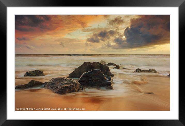 Sunset over the rocks Framed Mounted Print by Ian Jones