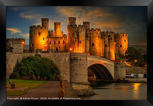 Lights On Conwy Castle Framed Print by Adrian Evans